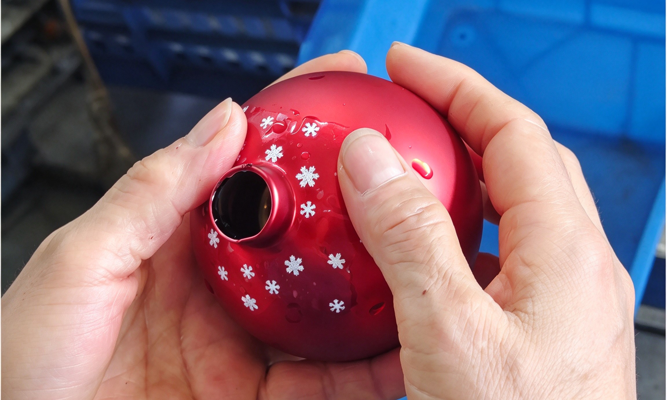 Applying decorative decals to handmade glass Christmas balls